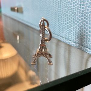 Authentic Tiffany & Co. retired Eiffel Tower charm.